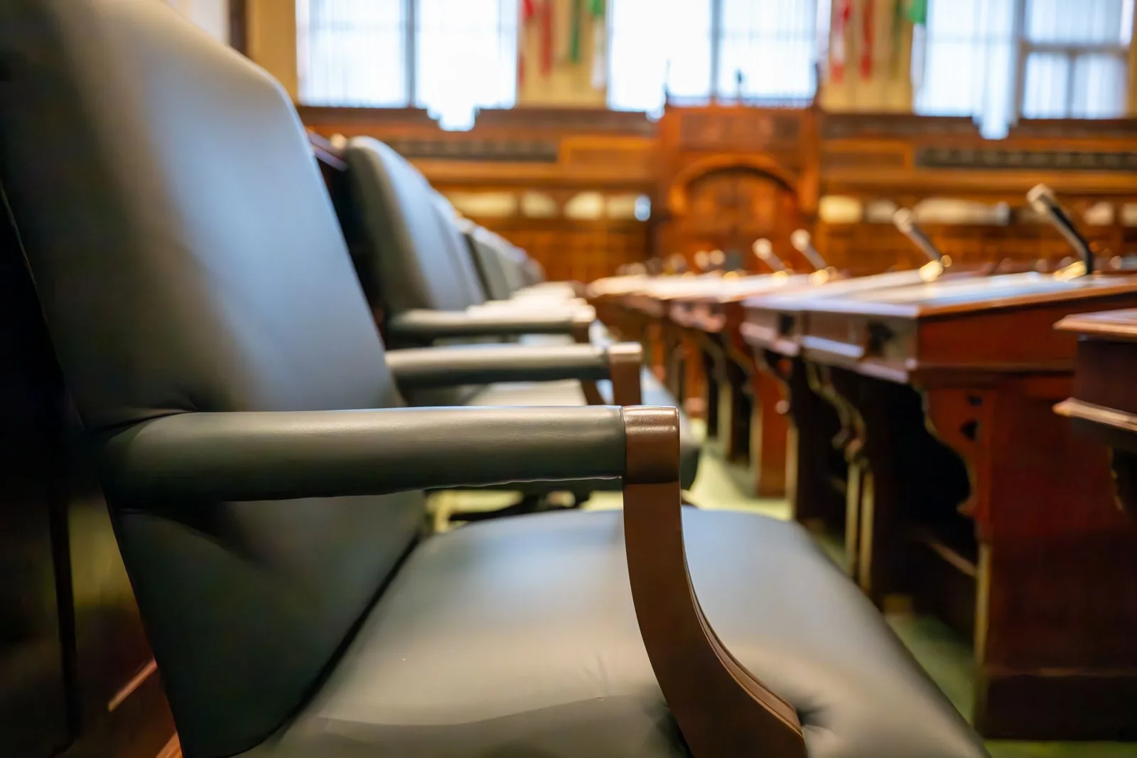 Courtroom seating and counsel tables in polished wood